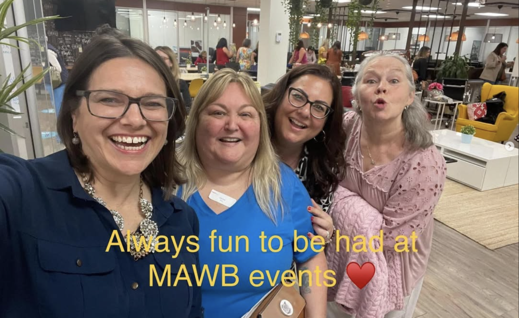 Meet Linsey Denham: Helping Women Find Their Way Back to Themselves 4 Linsey Denham enjoying a MAWB networking event with three fellow members, smiling together for a group photo that reflects the friendship, connection, and sense of community she has found through MAWB.